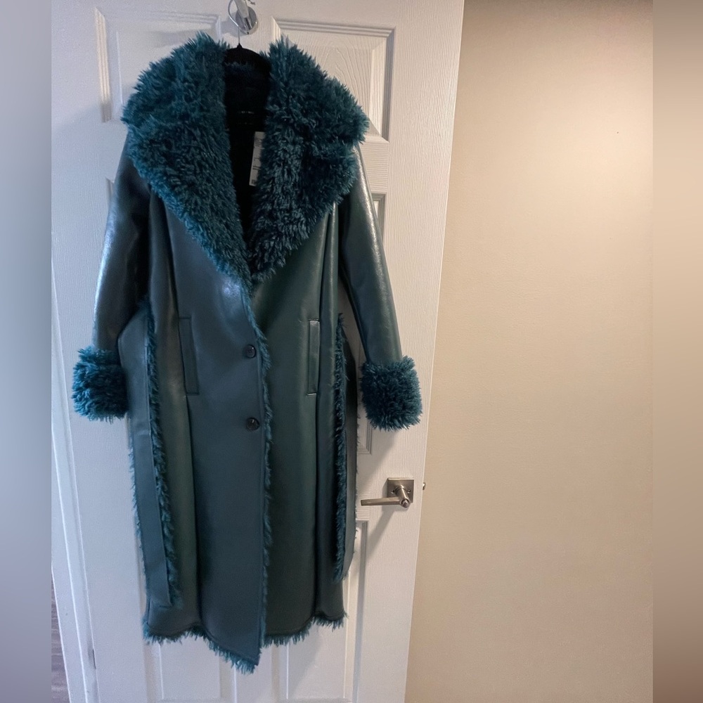 Faux leather trench.